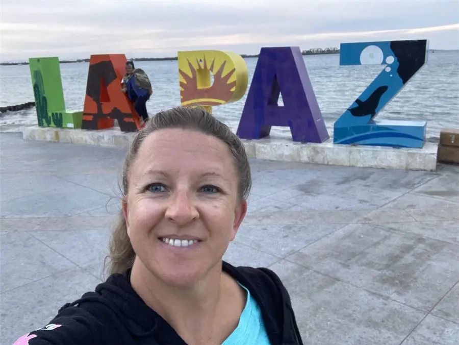 Selfie at the colorful La Paz sign